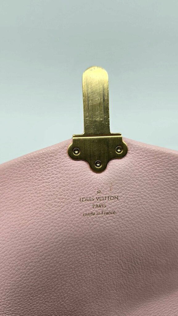 Louis Vuitton Clapton Leather Handbag