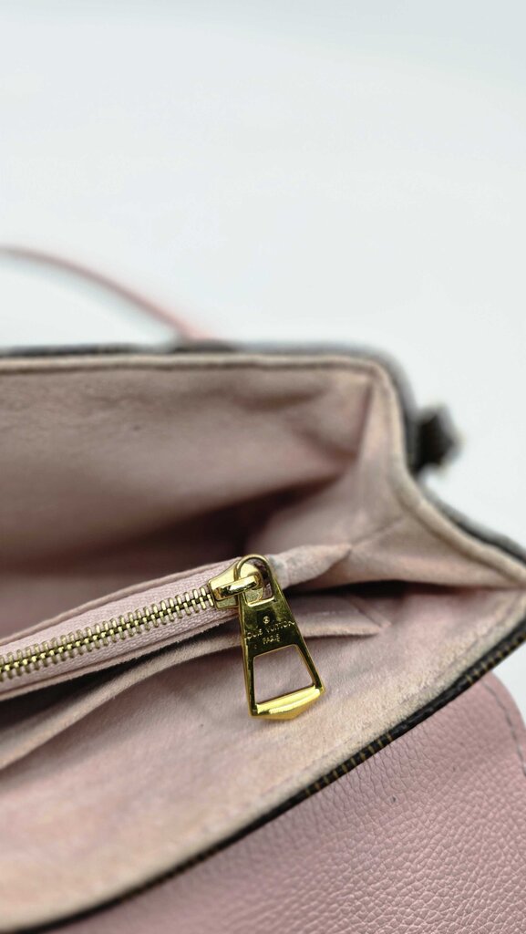 Louis Vuitton Clapton Leather Handbag