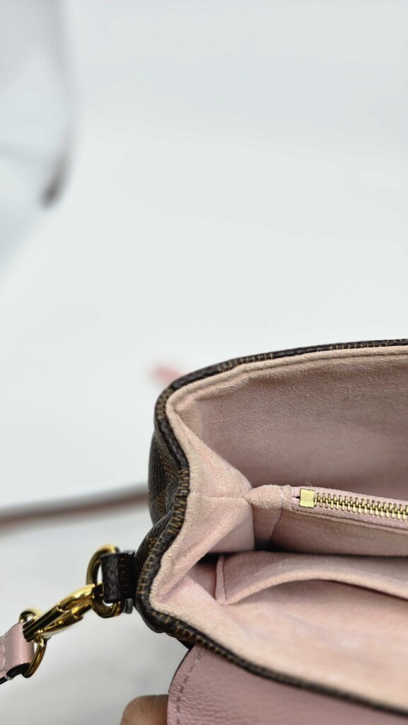 Louis Vuitton Clapton Leather Handbag