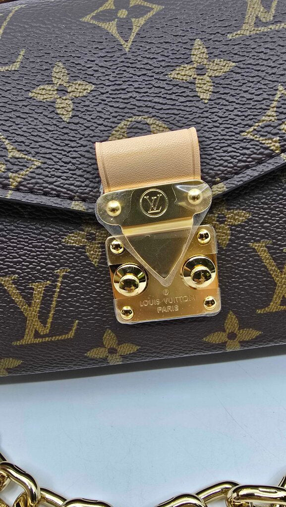 Louis Vuitton East West Metis Monogram Bag