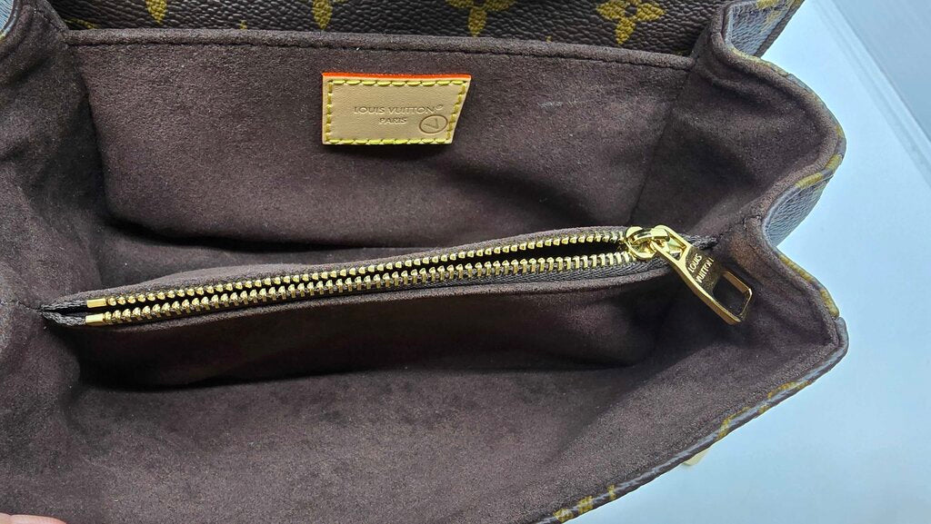 Louis Vuitton East West Metis Monogram Bag