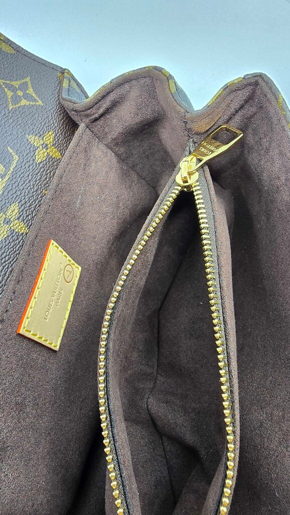 Louis Vuitton East West Metis Monogram Bag