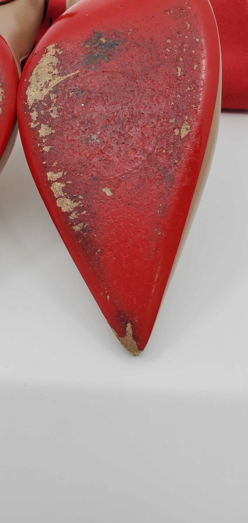 Louboutin Apostrophy Pointy Toe Pump