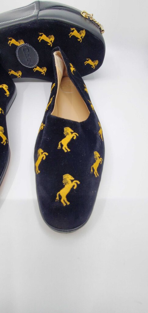 Chloe Skye velvet flats featuring gold "little horses" embroidery