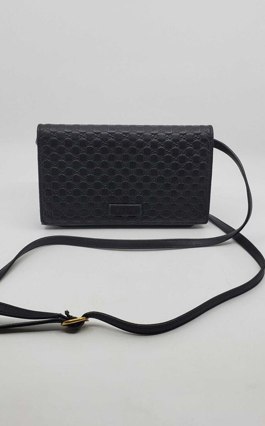Gucci Microguccissima crossbody wallet on strap