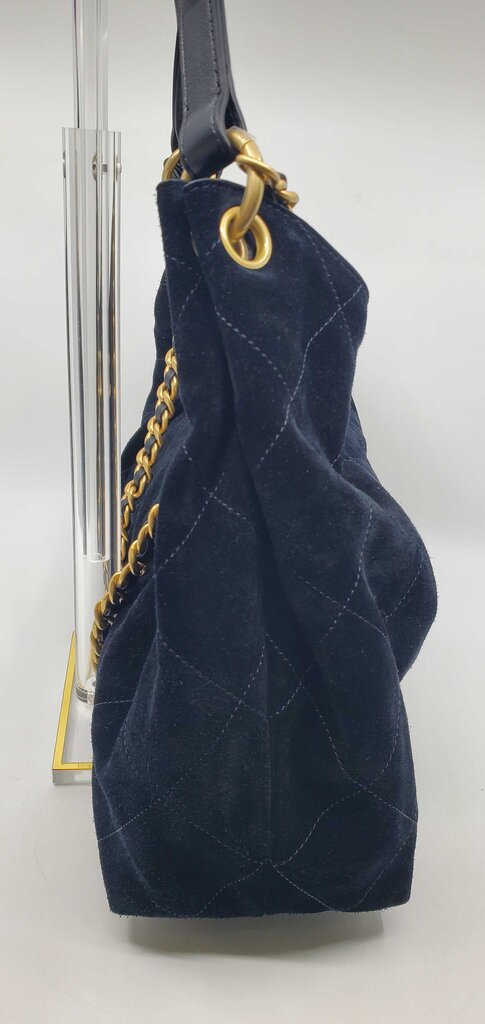 Chanel 2026 Maxi Hobo Bag in black suede with antique gold hardware