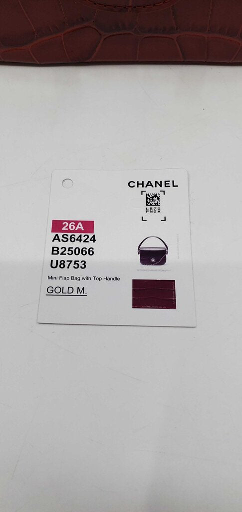 Chanel 2026 Calfskin Crocodile Embossed Turn Around Mini Flap