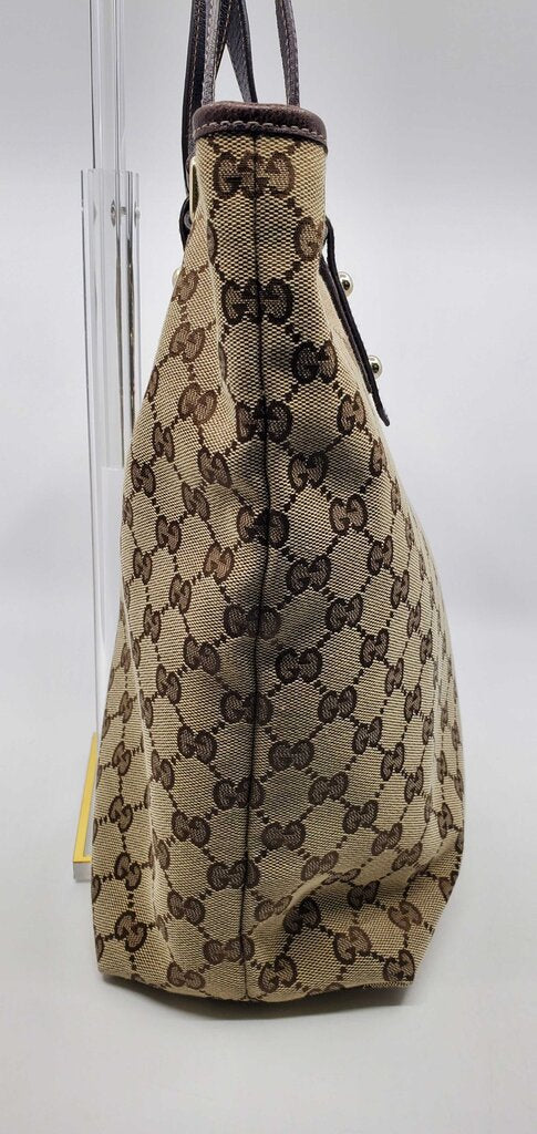 Gucci Beige/Brown GG Canvas tote bag featuring mushroom embroidery and a mushroom charm