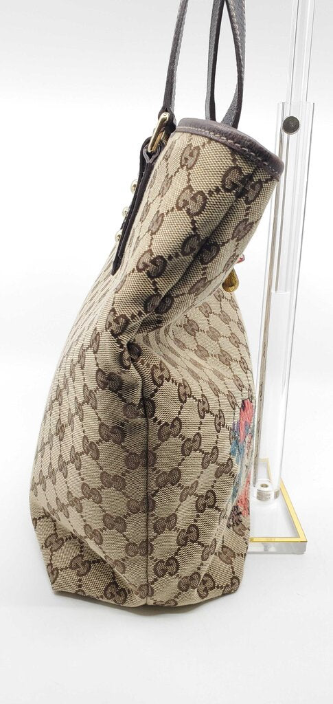 Gucci Beige/Brown GG Canvas tote bag featuring mushroom embroidery and a mushroom charm