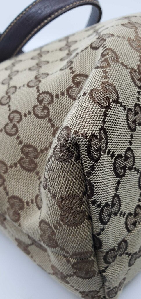 Gucci Beige/Brown GG Canvas tote bag featuring mushroom embroidery and a mushroom charm