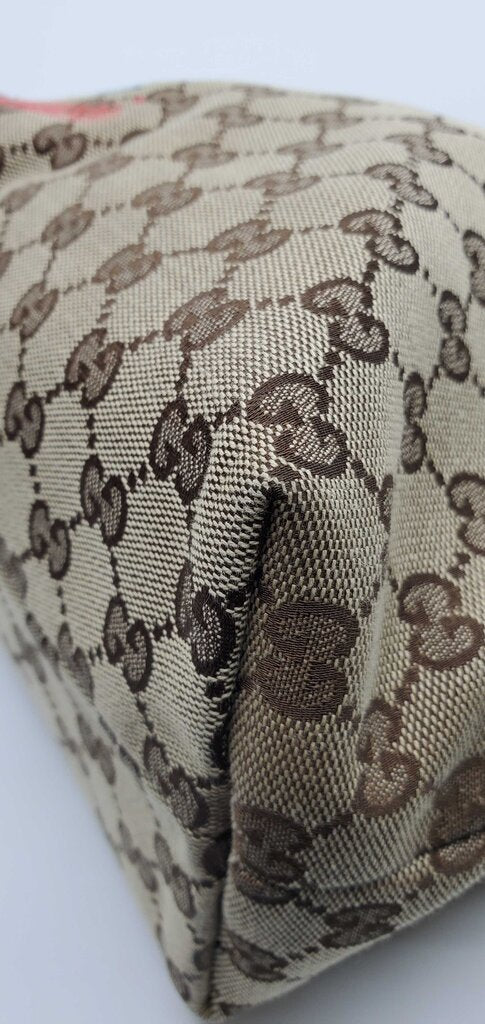 Gucci Beige/Brown GG Canvas tote bag featuring mushroom embroidery and a mushroom charm