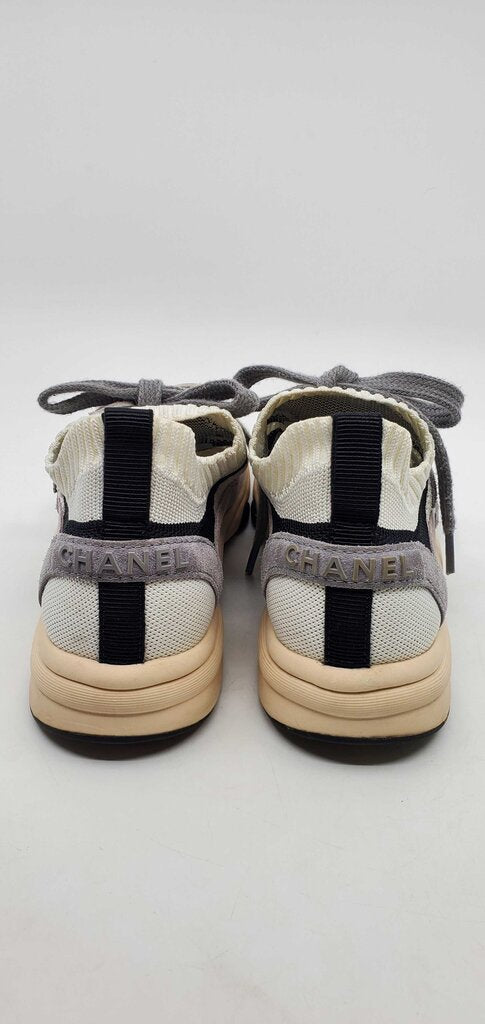 Chanel CC low top suede and knit mesh sneakers