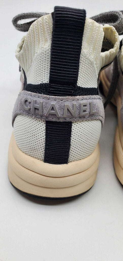 Chanel CC low top suede and knit mesh sneakers