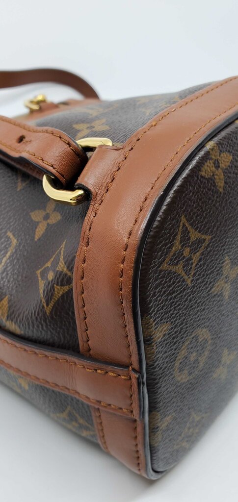 Louis Vuitton Monogram Reverse Dauphine Backpack in Canvas w/ Leather Trim