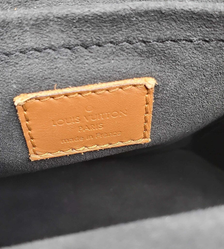Louis Vuitton Monogram Reverse Dauphine Backpack in Canvas w/ Leather Trim